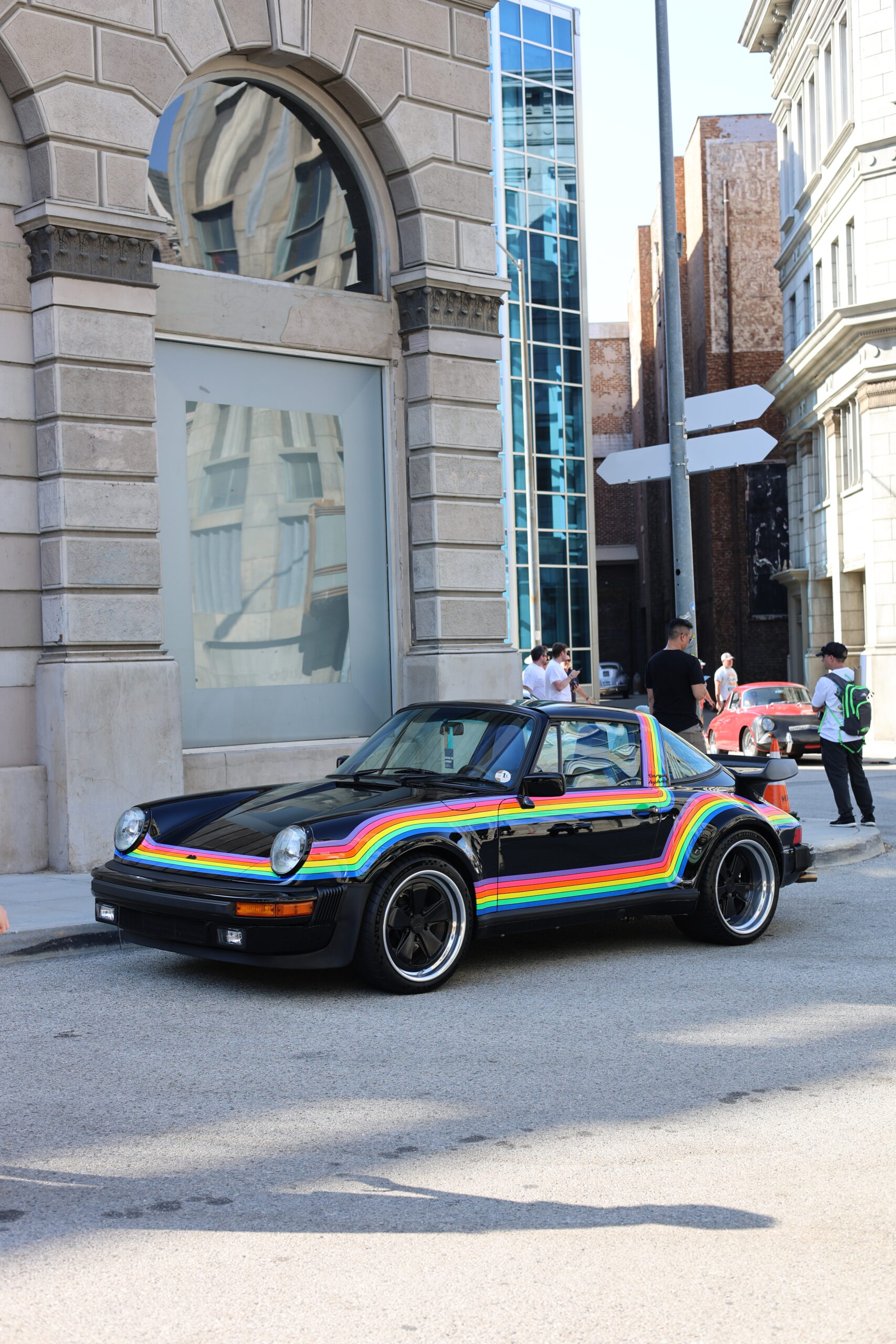 A Porsche 911 with rainbow stripe livery at Luftgekühlt 10