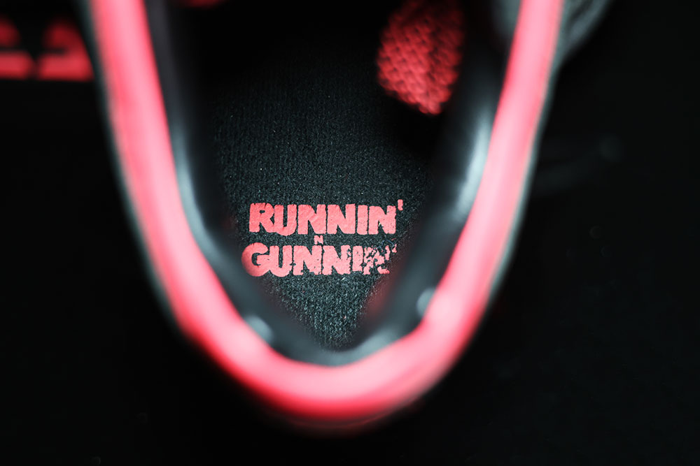 Runnin Gunnin printed on the footbed of the Nike Air Stab