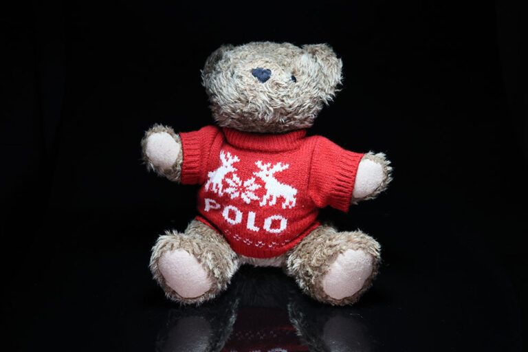 1998 Polo Ralph Lauren Polo Bear plush seated in its red reindeer Christmas sweater, full front view