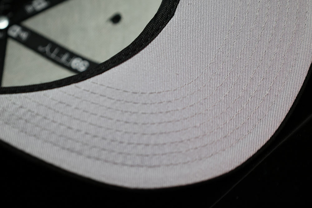 Grey underbrim and 59FIFTY brim of the Undefeated x New Era Icon Fitted, black Tokyo colorway